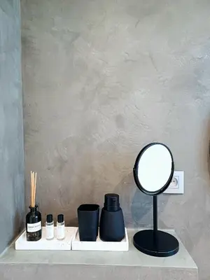 a mirror sitting on a shelf with other items at Charmant Studio - Centre-ville - 2min de Métro - 401 in Brussels