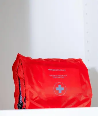 a red bag with a red cross on it at Cozy Studio - Downtown - 2 min from Metro - 201 in Brussels