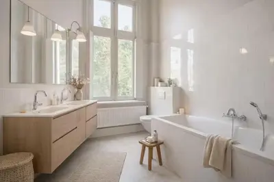 a bathroom with a tub and a toilet and a sink at Luxury villa with pool for 14 people in Essen