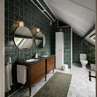 a bathroom with a sink and two mirrors at Luxury villa with pool for 14 people in Essen