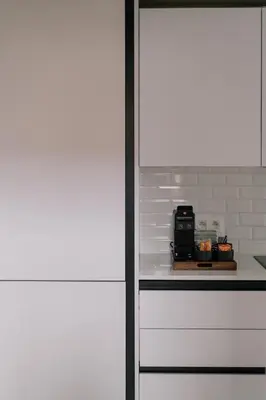 a kitchen with a counter top with a microwave at A Place Antwerp - Boutique Suites & Flats - Schuttershofstraat 1 in Antwerp