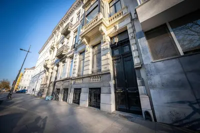a building on the side of a street at Le Machaon Antwerp Suite in Antwerp