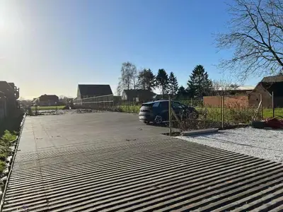a parking lot with a van parked in it at Apartment in Lochristi, close to Ghent & Lokeren! in Lochristi