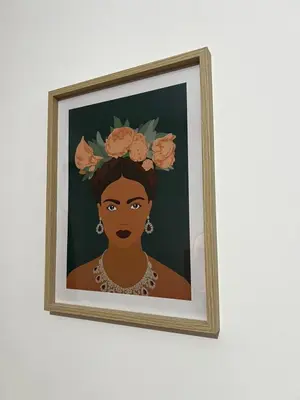 a painting of a woman with a flower crown at Un cocon chaleureux in Brussels