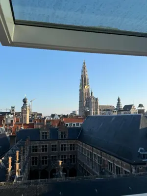 a view of a city skyline from a window at Amazing apartment with view in the centre in Antwerp