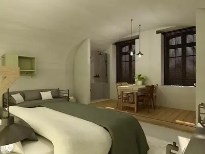 a bedroom with a bed and a dining room with a table at Erflogies Fort Liezele