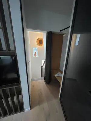 an overhead view of a stairway in a house at Aplusstudio in Zottegem
