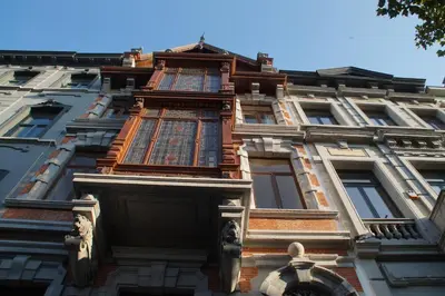 a building with windows on the side of it at Maison Jamaer in Brussels