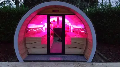 a round room with pink lights in it at Thermen Londerzeel Hotel in Londerzeel
