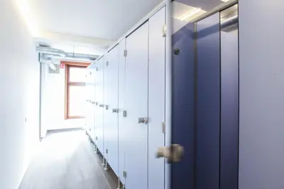 a row of lockers in a room with a window at Antwerp City Hostel in Antwerp