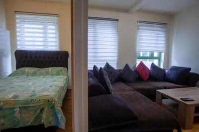 a living room with a couch and a table at ATW Apartments in Antwerp