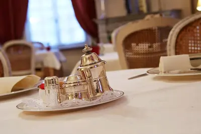 a silver model of a castle on a table at Hotel Ter Driezen in Turnhout