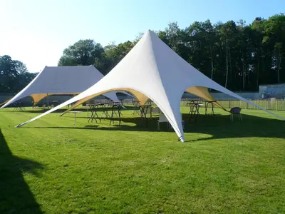 two large white tents sitting on a grass field at B&B Baron’s House Neerijse-Leuven in Neerijse
