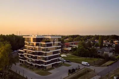 an aerial view of a building in a city at Van der Valk Hotel Beveren in Beveren
