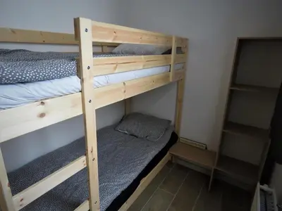 a couple of bunk beds in a room at Villa Einstein Apartments in Antwerp
