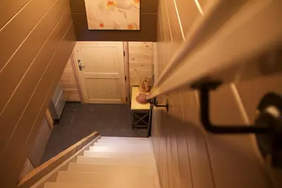 an overhead view of a staircase in a tiny house at Casa Delux in Lille