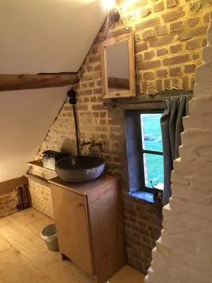 a bathroom with a sink and a window at Art Of Einstein in Diest