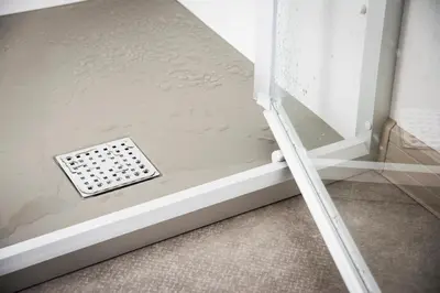 a metal grate in the corner of a room at Lake Park in Berlare