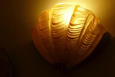a lamp with a light on top of it at CitytripGent Apartment in Ghent