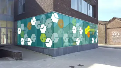 a building with a colorful mural on the side of it at Ooostel2.be Zaventem in Zaventem