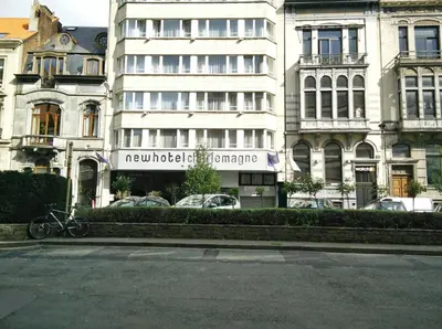 a bike parked in front of a building at New Hotel Charlemagne in Brussels