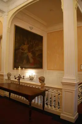 a room with a painting and a table with candles at Park Hotel Brussels in Brussels