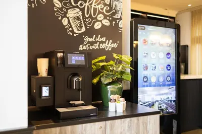 a coffee machine on a counter in a store at a&o Brussel Centrum in Brussels