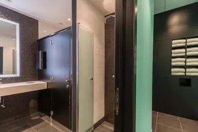 a bathroom with a shower and a sink at Thon Hotel Bristol Stephanie in Brussels