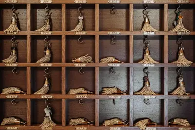 a shelf filled with lots of different types of knots at Craves in Brussels