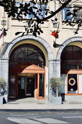 a building with three arches on the side of it at Bedford Hotel Brussels in Brussels