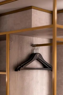 a black hanger on a shelf in a room at Van der Valk Waterloo in Waterloo