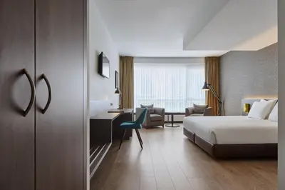 a hotel room with a bed and a desk at Theater Hotel in Antwerp