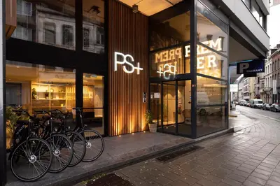 a store front with bikes parked outside of it at PREMIER SUITES Antwerp in Antwerp