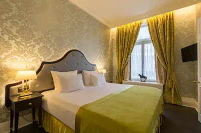 a bedroom with a large bed and a window at Stanhope Hotel by Thon Hotels in Brussels