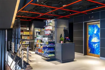 a wine shop with a large display of drinks at nhow Brussels Bloom in Brussels