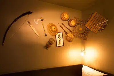 a room with a wall with various items on it at Hotel The Neufchatel in Brussels