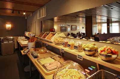 a buffet line with many different types of food at Hotel Van Belle in Brussels