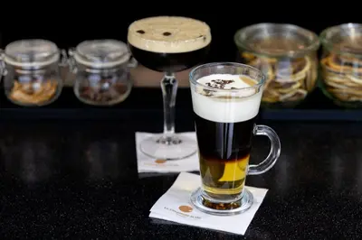 a couple of glasses of beer and a wine glass at Courtyard by Marriott Brussels EU in Brussels