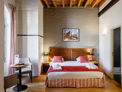 a bedroom with a large bed in a room at Ghent River Hotel in Ghent
