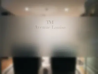 a sign that reads im inane house on a wall at Hotel Avenue Louise Brussels Trademark Collection by Wyndham in Brussels