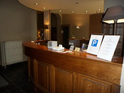 a bar in a hotel with a parking sign on it at Hotel De Franse Kroon in Diest