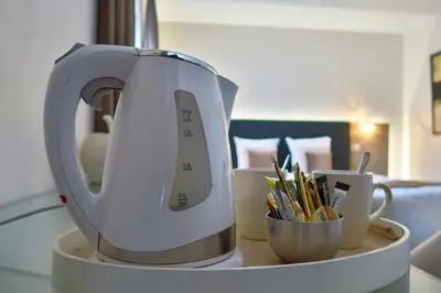 a white appliance sitting on top of a counter at Hotel Adoma in Ghent