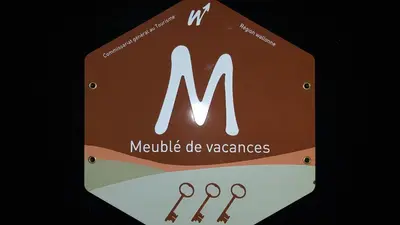 a sign with the chemical symbol for neptune with scissors at Studio Apartment Alba in La Hulpe