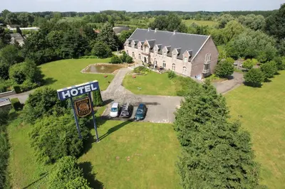 an overhead view of a house with a sign in front of it at Hotel Prins van Oranje in Diest