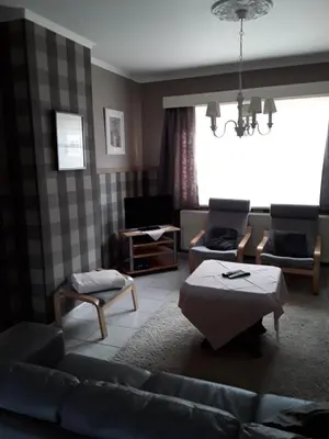 a living room with a couch and a table at Wenceslas Cobergher III in Bertem