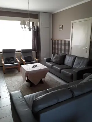 a living room with a couch and a table at Wenceslas Cobergher III in Bertem
