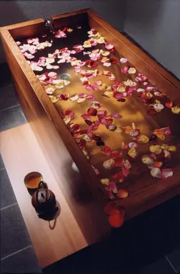 a wooden tray filled with flowers in a wooden box at Hotel Dolce La Hulpe Brussels in La Hulpe