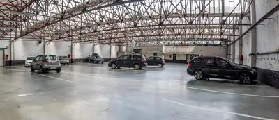 a group of cars parked in a parking lot at Arass Hôtel & Business Flats in Antwerp