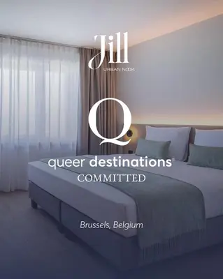 a bedroom with a bed and a sign that says queen destinationsmitted at Jill Hotel Brussels in Brussels