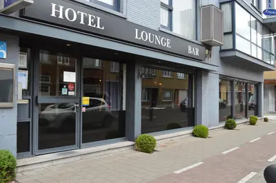 a store front of a hotel lounge bar on a street at Hotel Royal Zelzate in Zelzate